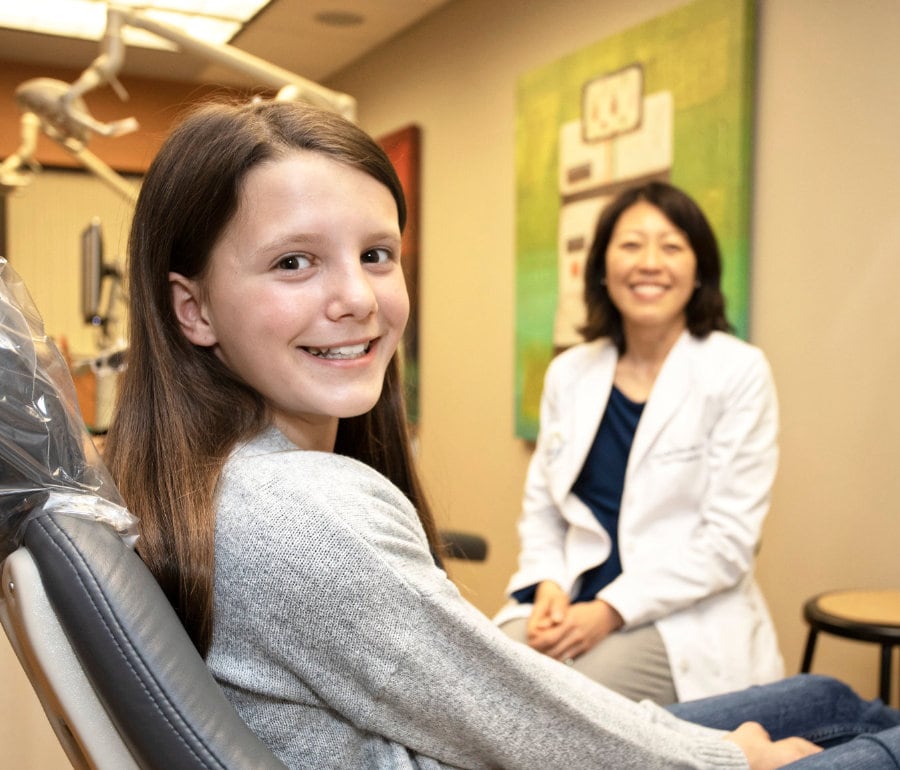 teen smiling with dr. sohn during visit
